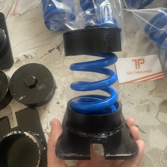 Lò xo chống rung (giảm chấn)